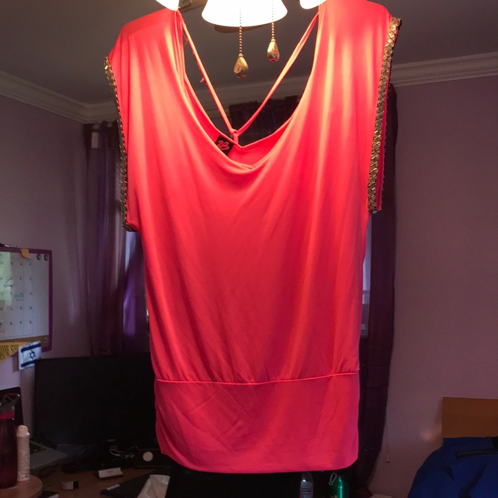 HOT PINK BEBE SHIRT NEVER WORN. NO TAGS